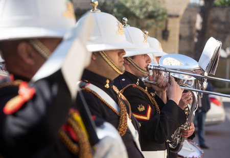 ST. JULIAN'S - MALTA, 30 March 2017: Military band and warriors of the guard of honor during an official meeting of President of Ukraine Petro Poroshenko and President of the Republic of Malta, Marie Louise Coleiro Precaのeditorial素材
