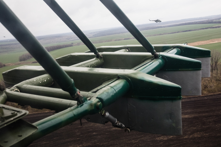 LUGANSK REG, UKRAINE - Apr 12, 2017: Military helicopters on combat duty. Weaponry and military equipment of the armed forces of Ukraineのeditorial素材