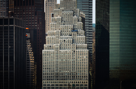 NEW YORK, USA - Apr 27, 2016: Streets of Manhattan, New York City. Manhattan is the most densely...