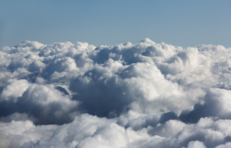 Sky with clouds, a view from an aeroplane above the cloudsの写真素材