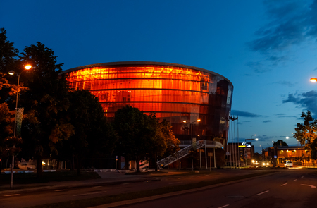 LIEPAJA, LATVIA - Jun 25, 2017: Concert hall Great Amber (LIELAIS DZINTARS) is a regional centre of culture, home to the Liepaja Symphony Orchestra, Liepaja Music, Art and Design High School at nightのeditorial素材