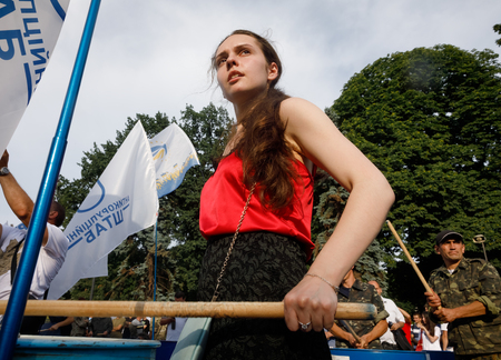KIEV, UKRAINE - Jul 11, 2017: Ukrainian activists drum empty barrels, burn flares and smoke grenades during a rally in front of the Parliament building. Rally for the removal of parliamentary immunityのeditorial素材