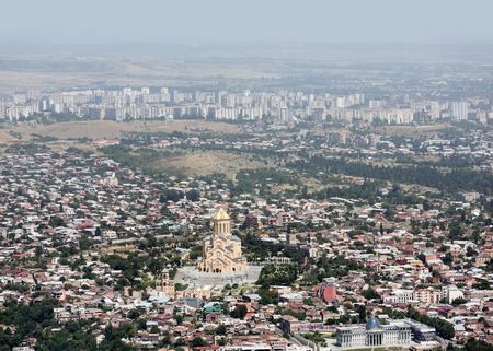 TBILISI, GEORGIA, Jul. 18, 2017: Aerial skyline with the Holy Trinity Cathedral of Tbilisi commonly...