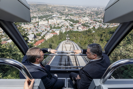 TBILISI, GEORGIA, Jul 18, 2017: Prime Minister of Georgia Giorgi Kvirikashvili and President of Ukraine Petro Poroshenko on the funicular in an informal atmosphereのeditorial素材