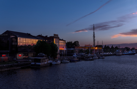 LIEPAJA, LATVIA - JUN 25, 2017: Liepajas beautiful evening at sunset. Yachts and boats moored in the harbour in Liepajaのeditorial素材