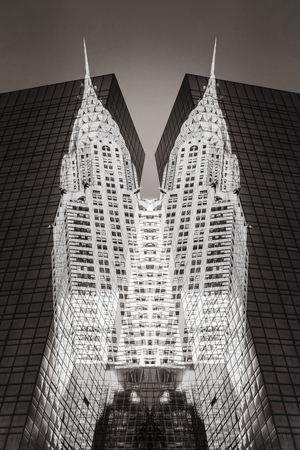 Abstract symmetrical image of New York. Double exposure.  Black and white image of Chrysler Building and Manhattan modern architecture.のeditorial素材