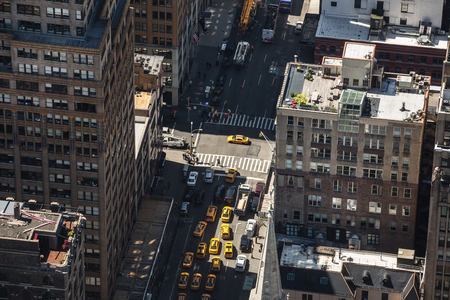 NEW YORK, USA - Apr 30, 2016: Streets and roofs of Manhattan. New York City Manhattan midtown birds...