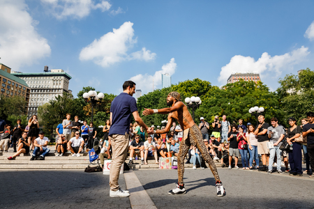 NEW YORK, USA - Sep 16, 2017: Street Dancers at Union Square in Manhattan. People standing around a group of street artists in Union Squareのeditorial素材