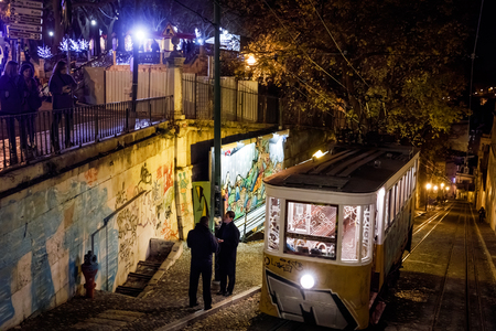 LISBON, PORTUGAL - Dec. 17, 2017: Lisbon Tram and Funicular Network at night. Gloria Funicular is a funicular railway line in the civil parish of Santo Antonio, in the municipality of Lisbonのeditorial素材