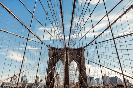NEW YORK, USA - Sep 22, 2017: Brooklyn Bridge in New York City. Brooklyn Bridge is a hybrid cable-stayed suspension bridge in NYC and is one of the oldest roadway bridges in the United Statesのeditorial素材