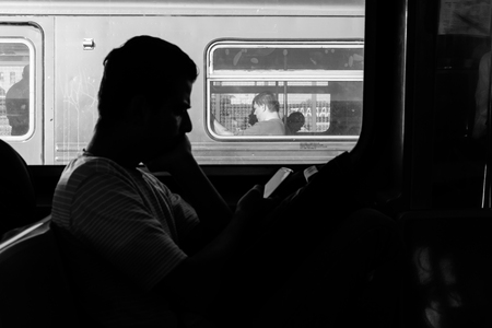NEW YORK, USA - Sep 22, 2017: New York City Subway. Passengers in the subway train car. NYC Subway...