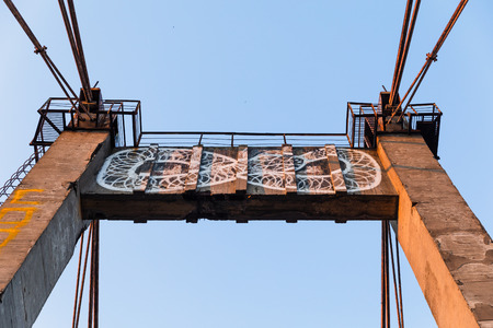 KIEV, UKRAINE - May 30, 2018: Fragment of old cable-stayed Rybalsky bridge in the evening during...