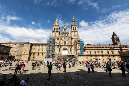 SANTIAGO DE COMPOSTELA, SPAIN - JUN 02, 2018: Facade of Santiago de Compostela cathedral in Obradoiro square. Santiago de Compostela street sceneのeditorial素材