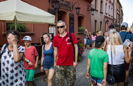 Lublin, Poland - Jul 27, 2018: Crowds of tourists and holidaymakers on the streets of the old city of Lublin. Lublin is the ninth largest city in Polandのeditorial素材