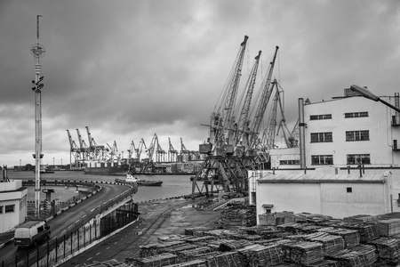 Odessa, Ukraine - Sep 10, 2018: Marine Industrial Commercial Port. Industrial zone of Odessa sea port. Container cranes. Cargo container terminal of sea freight industrial port.のeditorial素材