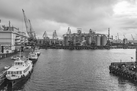 Odessa, Ukraine - Sep 10, 2018: Marine Industrial Commercial Port. Industrial zone of Odessa sea port. Container cranes. Cargo container terminal of sea freight industrial port.のeditorial素材