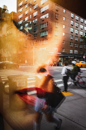 New York, USA - Sep 24, 2018: Soft focus and blurred image of Manhattan street scene. Abstract image of lights, shadows and reflections on the streets of NYC. Americans on the streets of New York Cityのeditorial素材