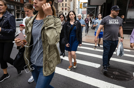 New York, USA - Sep 24, 2018: New York and New Yorkers. Manhattan street scene. The Americans on the...