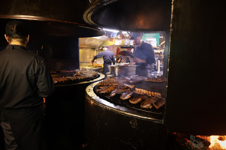 Lviv, Ukraine - Oct 13, 2018: Arsenal Ribs And Spirits. Medieval Themed restaurant near the armoury. Very popular place among tourists.のeditorial素材