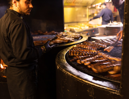 Lviv, Ukraine - Oct 13, 2018: Arsenal Ribs And Spirits. Medieval Themed restaurant near the armoury. Very popular place among tourists. Motion blurred image.のeditorial素材