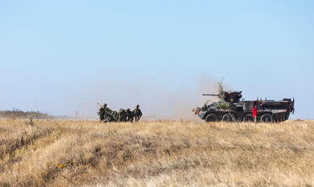 DONETSK REG, UKRAINE - Okt 12, 2018: Military equipment at a military training ground during complex tactical exercises of diverse military forces for the defense of coastal area in the Donetsk regionのeditorial素材