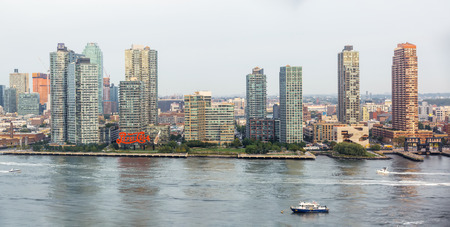 New York, USA - Sep 21, 2016: View of Hunters Point in Long Island City from the United Nations headquarters. Historic billboard of Pepsi Cola at Hunters Pointのeditorial素材