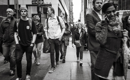 NEW YORK, USA - May 03, 2016: Black and white Manhattan street scene. New Yorkers and tourists walking on the streets of Manhattan in New York City.のeditorial素材