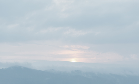 Natural sky background with clouds in light tonality. Abstract nature image for background use.
