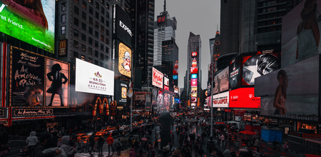 NEW YORK, USA - Apr 30, 2016: Times Square in the rainy evening. Brightly adorned with billboards...