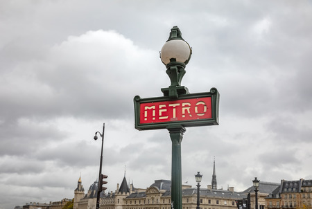 PARIS, FRANCE - Nov 10, 2017: Metro Sign in Paris. Old traditional signpost for subway transportation in France.のeditorial素材