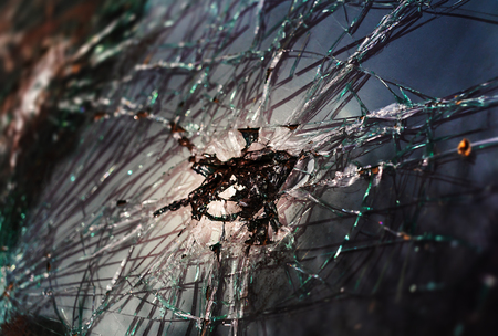 Abstract image of broken glass texture. Close-up broken car windshield. Broken and damaged carの写真素材