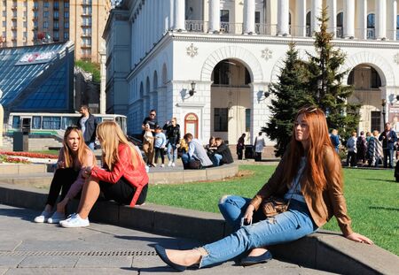 KYIV, UKRAINE - May 03, 2017: Young people resting on the green lawn on a sunny spring day. Citizens have a rest on the lawn at the Independence Squareのeditorial素材