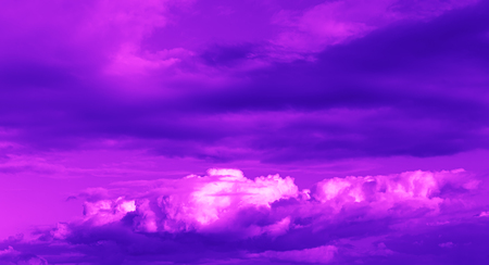 Abstract nature background. Sky with dramatic clouds. Image in trendy neon colorsの写真素材
