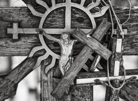 SIAULIAI, LITHUANIA - JUL 22, 2018: Old wooden sculptures on religious themes at the Hill of Crosses. Hill of Crosses is a unique monument of history and religious folk artのeditorial素材