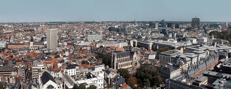 BRUSSELS, BELGIUM - May 14, 2019: Roofs and streets of Brussels. Panoramic view on Notre Dame du...