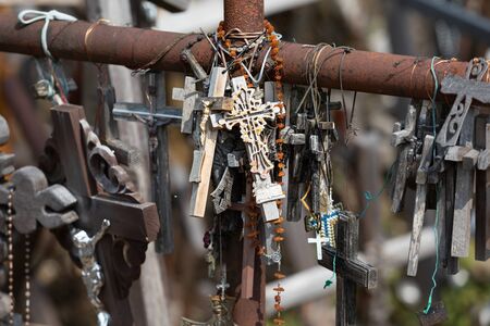 Crucifixion of Christ and a large number of crosses at Hill of Crosses. Hill of Crosses is a unique monument of history and religious folk art in Siauliai, Lithuania.の写真素材