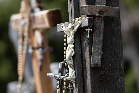 Crucifixion of Christ and a large number of crosses at Hill of Crosses. Hill of Crosses is a unique monument of history and religious folk art in Siauliai, Lithuania.の写真素材