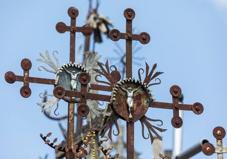 Crucifixion of Christ and a large number of crosses at Hill of Crosses. Hill of Crosses is a unique monument of history and religious folk art in Siauliai, Lithuania.の写真素材