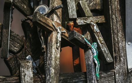 Crucifixion of Christ and a large number of crosses at Hill of Crosses. Hill of Crosses is a unique...