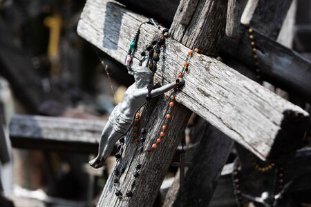 Crucifixion of Christ and a large number of crosses at Hill of Crosses. Hill of Crosses is a unique...