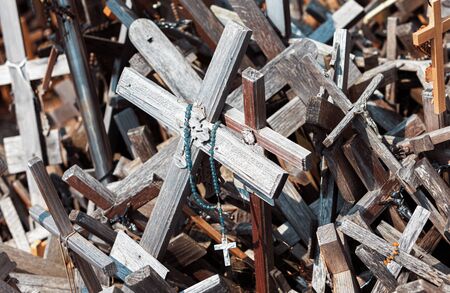 Crucifixion of Christ and a large number of crosses at Hill of Crosses. Hill of Crosses is a unique...