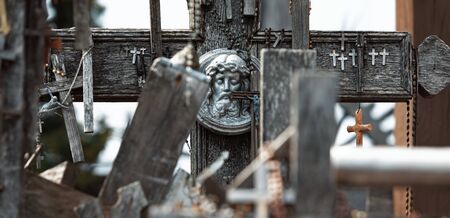Crucifixion of Christ and a large number of crosses at Hill of Crosses. Hill of Crosses is a unique monument of history and religious folk art in Siauliai, Lithuania.の写真素材