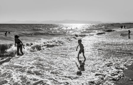 Belek,  Turkey - Aug. 08, 2019: Vacationers on the beach near the sea. Vacation and happy life style concept. Summer holidays backgroundのeditorial素材