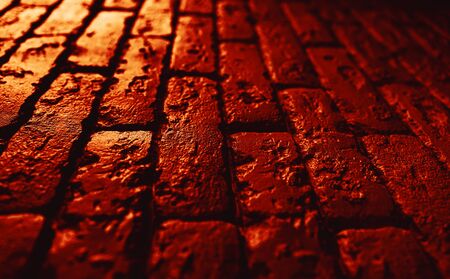 Abstract urban background. Modern white brick wall texture. Image in red-yellow colorsの写真素材