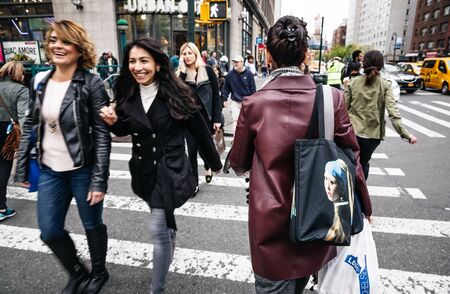 NEW YORK, USA - Apr 28, 2016: Manhattan street scene. The Americans on the streets of New York....