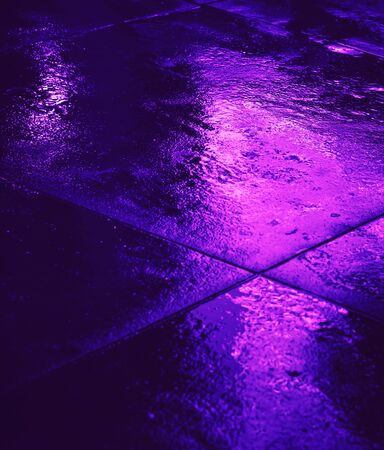 Illumination and neon night lights of NYC. Abstract image of neon lights on the streets of New York City. Multiple exposure and intentional motion blurの写真素材