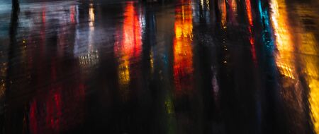 Illumination and neon night lights of NYC. Abstract image of neon lights on the streets of New York City. Multiple exposure and intentional motion blurの写真素材