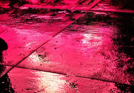 Illumination and neon night lights of NYC. Abstract image of neon lights on the streets of New York City. Multiple exposure and intentional motion blurの写真素材