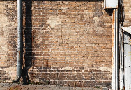 Brick wall background texture and wallpaper. Background of old vintage dirty brick wall