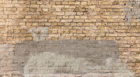 Brick wall background texture and wallpaper. Background of old vintage dirty brick wall